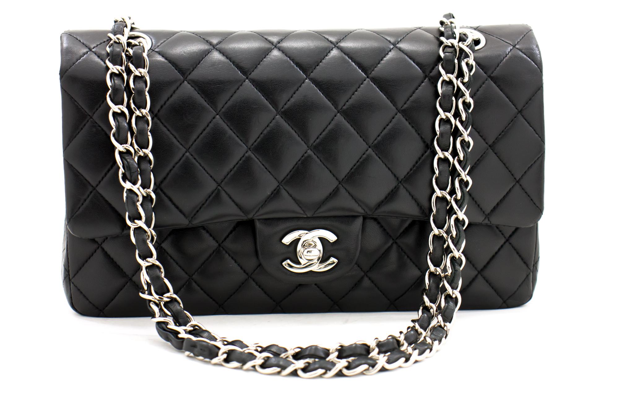 An authentic CHANEL 2.55 Classic Double Flap Medium Silver Chain Shoulder Bag Black. The color is Black. The outside material is Leather. The pattern is Solid. This item is Contemporary. The year of manufacture would be 2009.
Conditions &