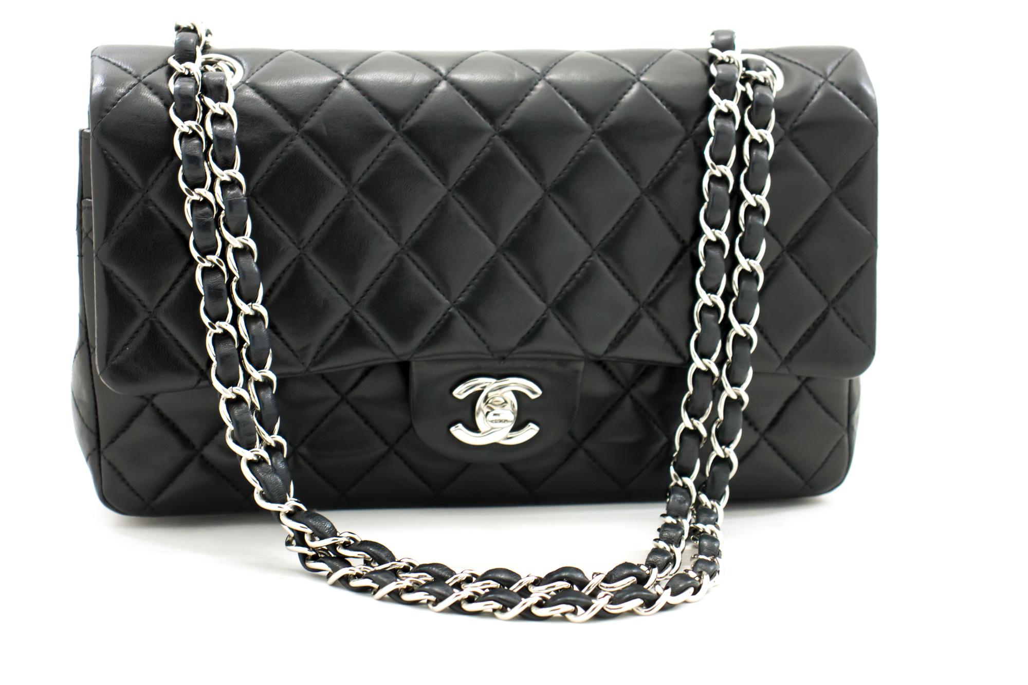 An authentic CHANEL 2.55 Classic Double Flap Medium Silver Chain Shoulder Bag Black. The color is Black. The outside material is Leather. The pattern is Solid. This item is Contemporary. The year of manufacture would be 2003.
Conditions &