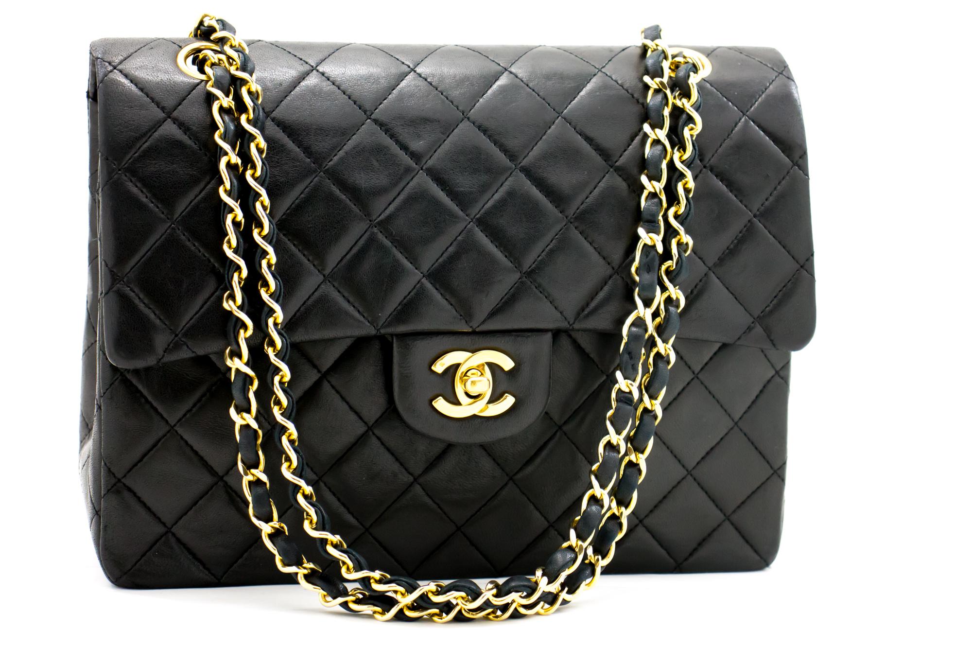 An authentic CHANEL 2.55 Classic Double Flap Square Chain Shoulder Bag Black made of black Lambskin. The color is Black. The outside material is Leather. The pattern is Solid. This item is Vintage / Classic. The year of manufacture would be
