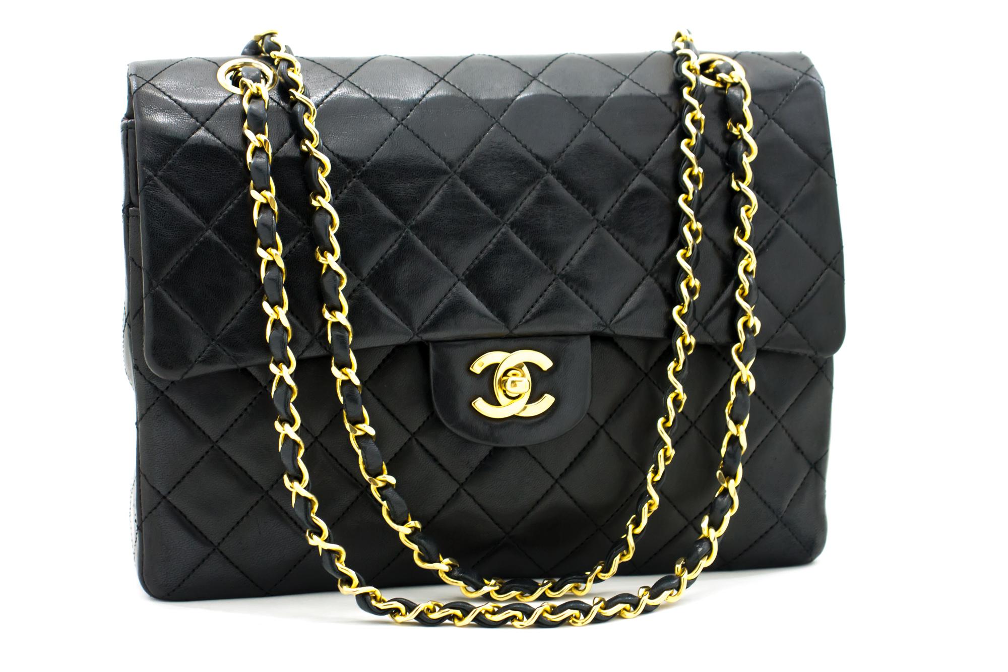 An authentic CHANEL 2.55 Classic Double Flap Square Chain Shoulder Bag Black made of black Lambskin. The color is Black. The outside material is Leather. The pattern is Solid. This item is Vintage / Classic. The year of manufacture would be