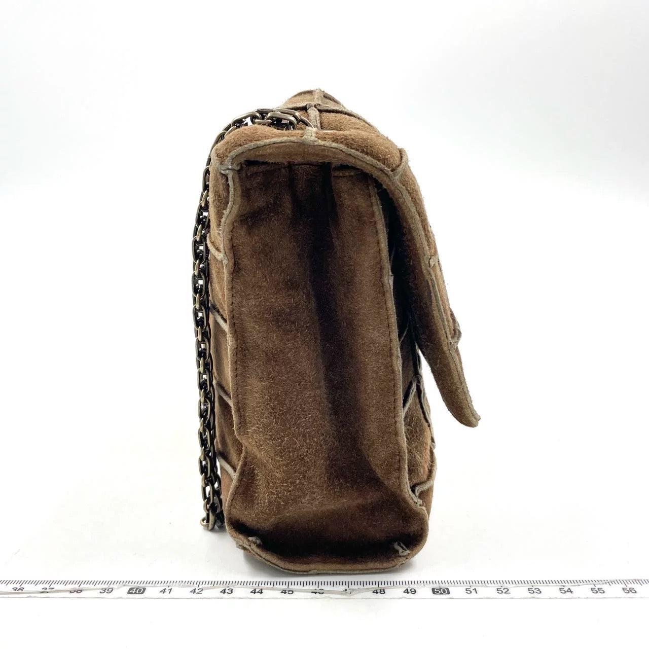 Chanel 2.55 Flap Bag Vintage Chocolate Bar 1997 Medium Suede Brown
These are professional photos of the actual bag.
  This Chanel 2.55 Flap bag features a mademoiselle turn lock and is made of suede leather, square quilt wild stitch, accented with