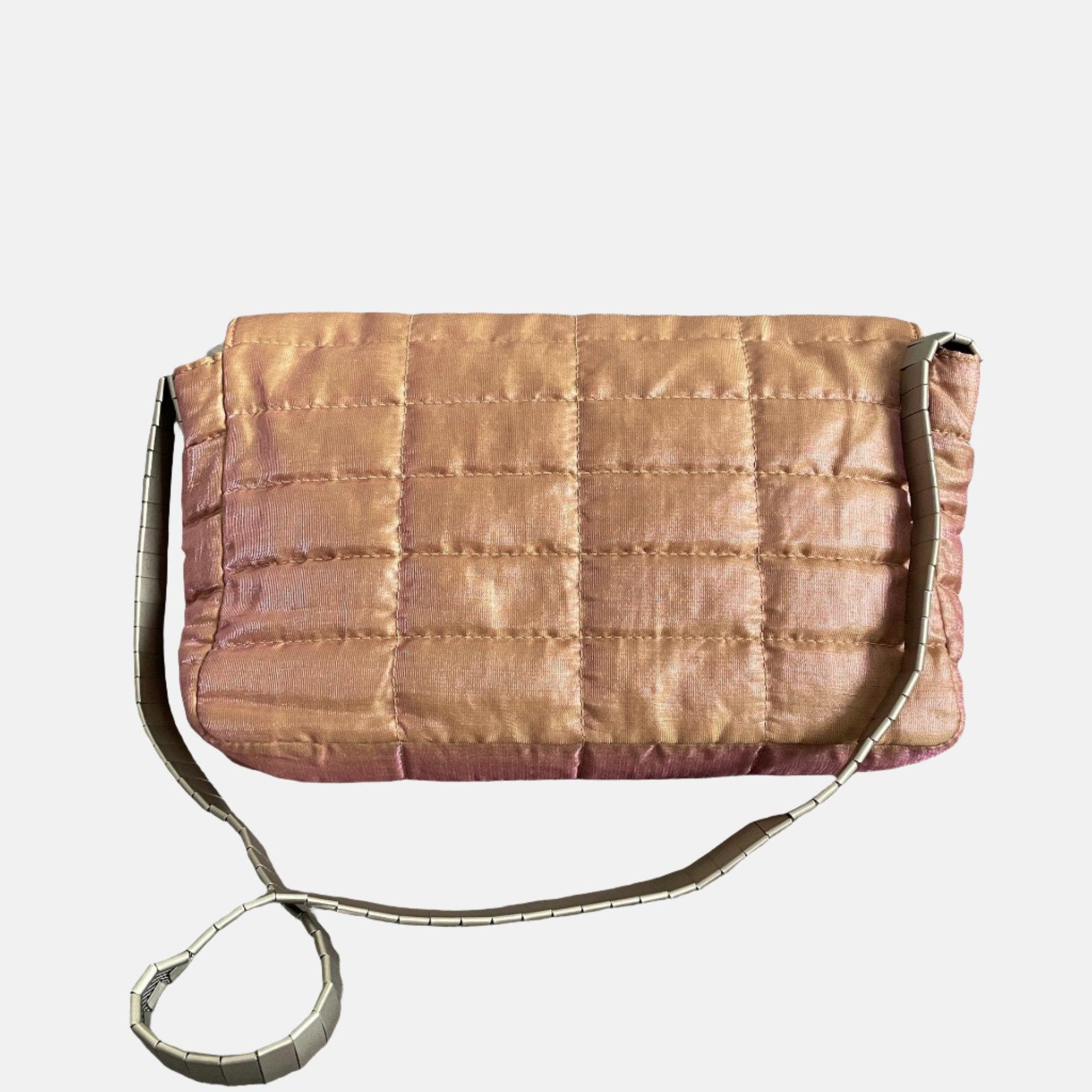 Chanel 2.55 Flap Bag Vintage Cloth Chocolate Bar 1997 Small Iridescent Pink
These are professional photos of the actual bag.
  This Chanel 2.55 Flap bag features a mademoiselle turn lock and is made of pink iridescent cloth, square quilt wild