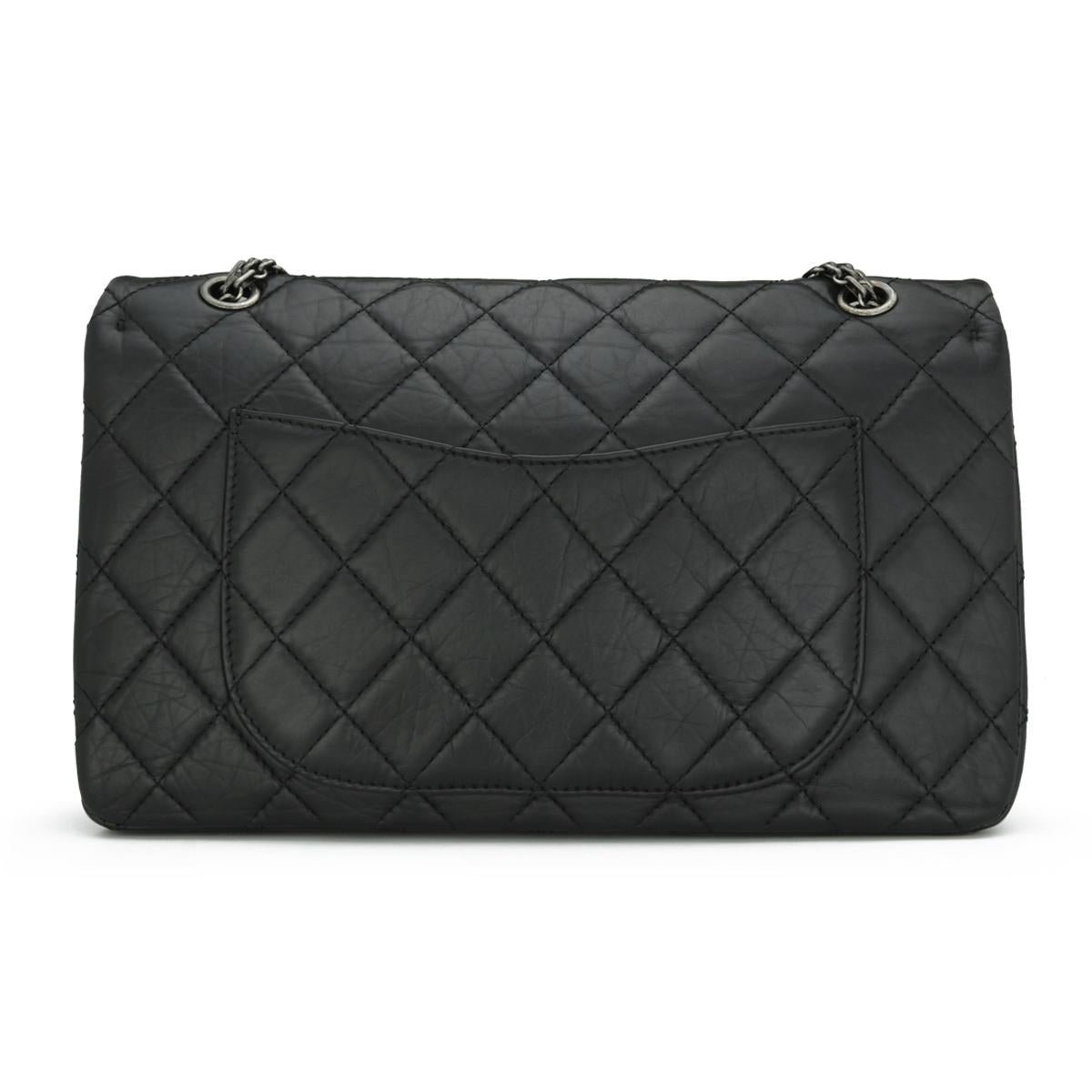 CHANEL 2.55 Reissue 227 Quilted Flap Bag in Black Aged Calfskin with Ruthenium Hardware 2014.

This stunning bag is in excellent condition. It retains its original shape, and the hardware is still very shiny.

It is a super practical, durable bag