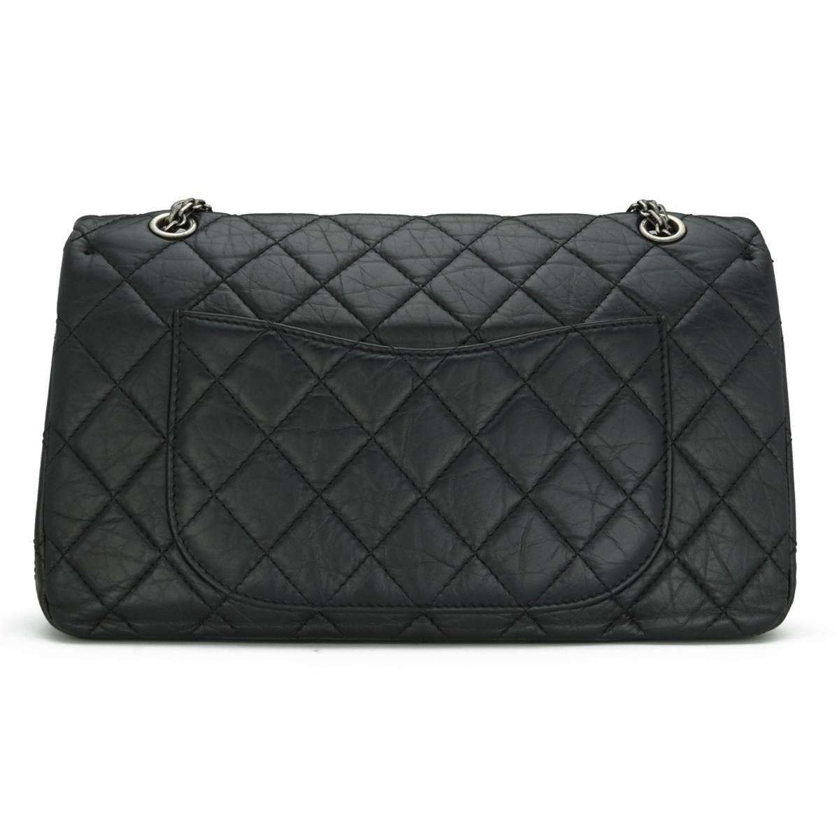 CHANEL 2.55 Reissue 227 Quilted Flap Bag in Black Aged Calfskin with Ruthenium Hardware 2014.

This stunning bag is in very good condition; it still holds its shape well, and the hardware is still very shiny.

It is a super practical, durable bag