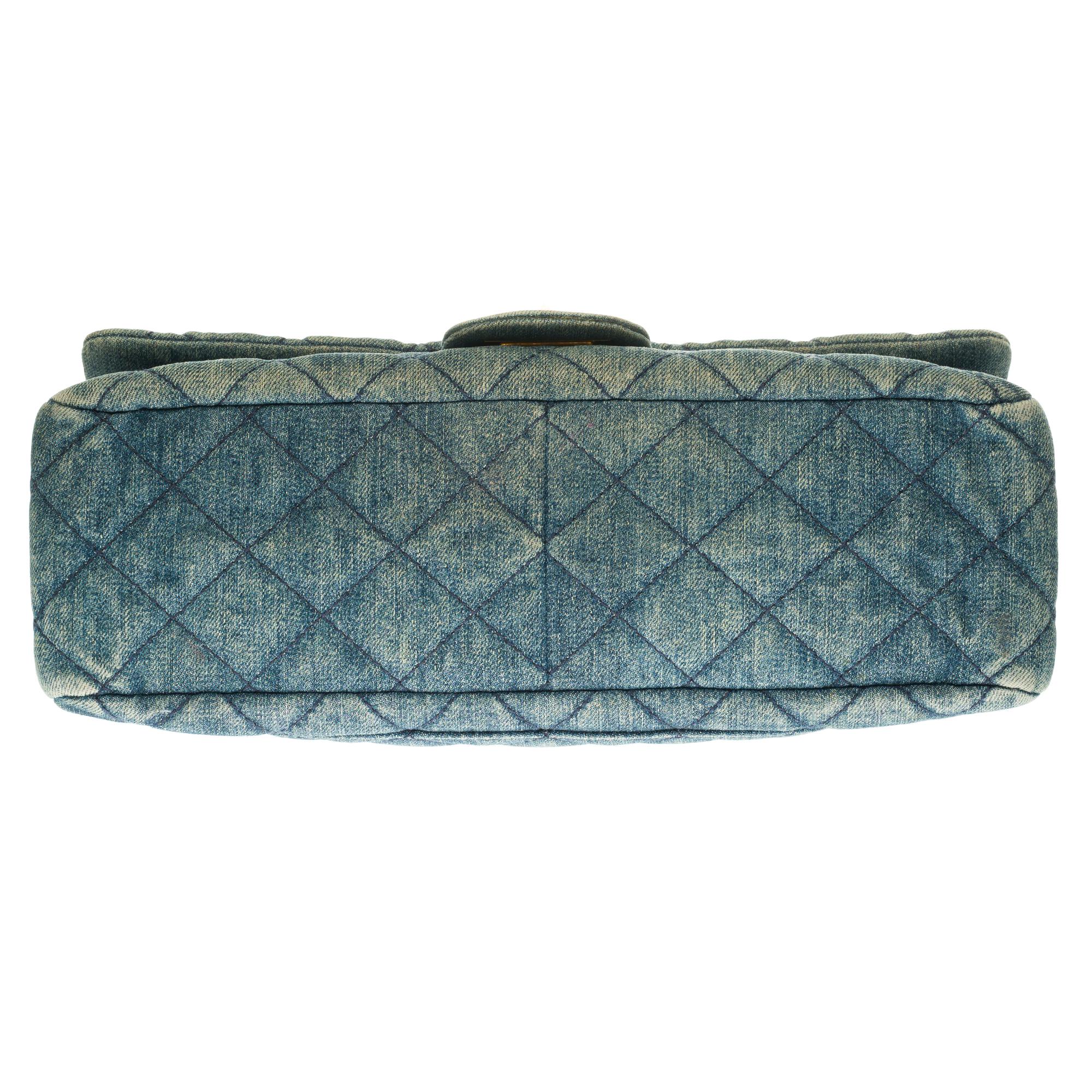 Chanel 2.55 Reissue 227 handbag in blue quilted denim with bronze hardware 1