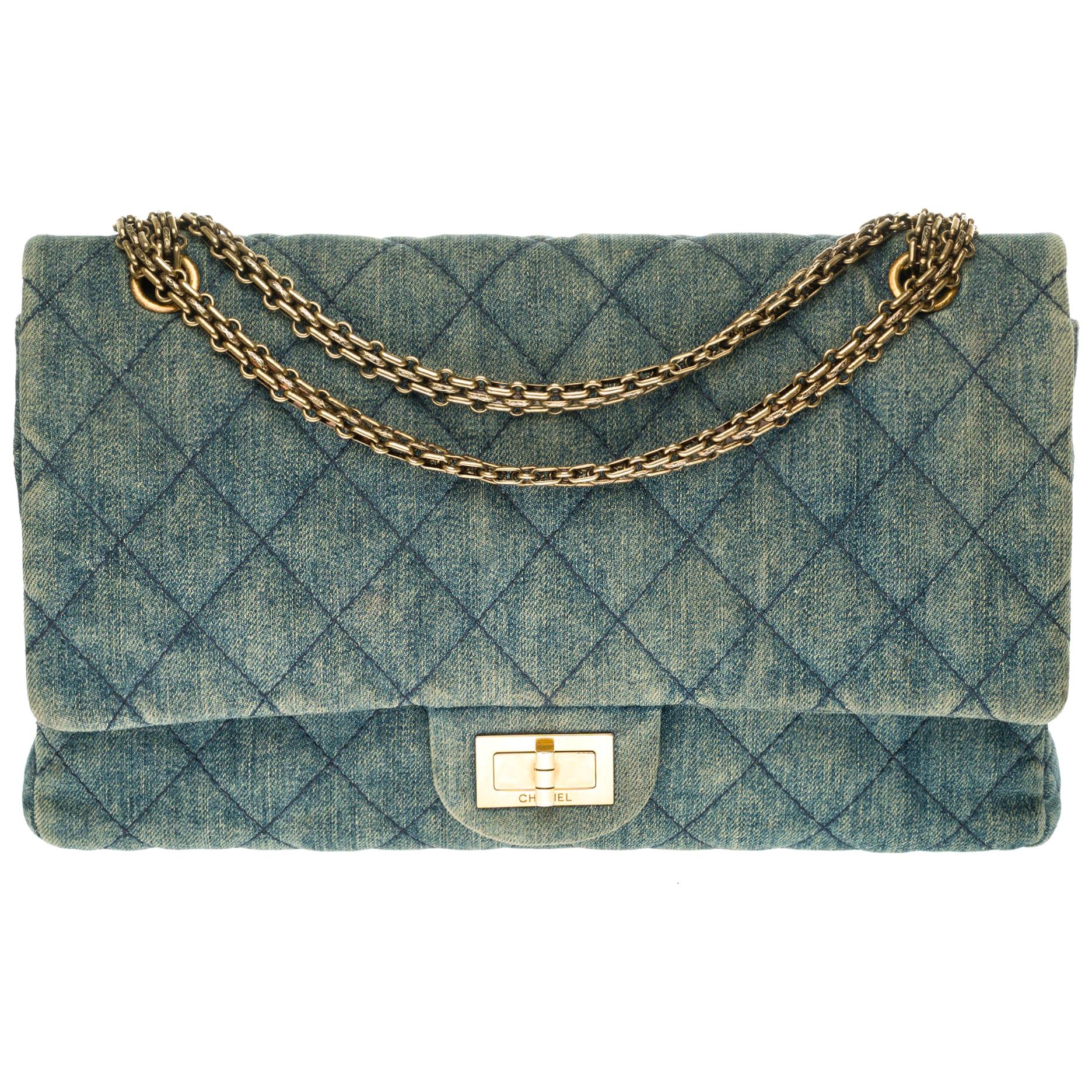 Chanel 2.55 Reissue 227 handbag in blue quilted denim with bronze hardware