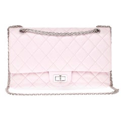 Chanel 2.55 Reissue 227 handbag in pink quilted leather and silver hardware