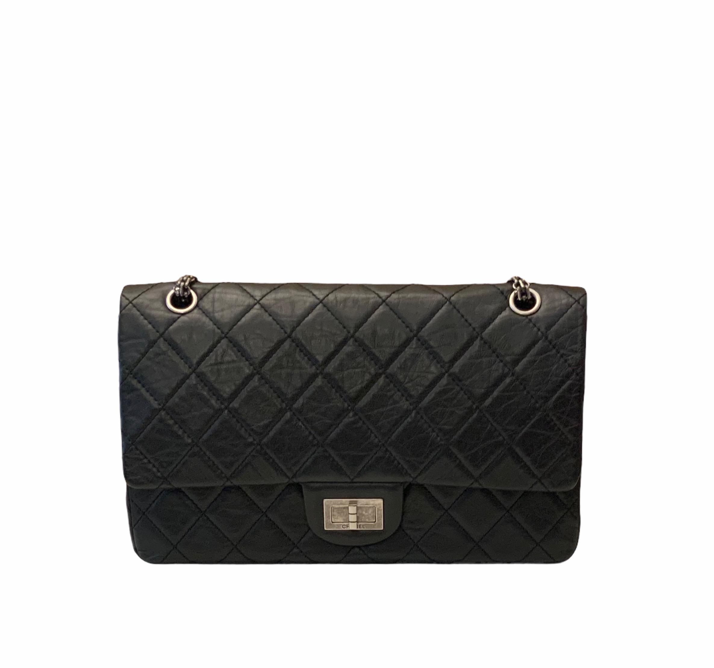 A 2.55 Reissue is a 2005 version of the 2.55 that Karl Lagerfeld reintroduced as an exact recreation of the original and this is why it is made in France.
This gorgeous pre-owned Chanel black 2.55 Classic 227 Flap Bag - 5 pockets is the most iconic