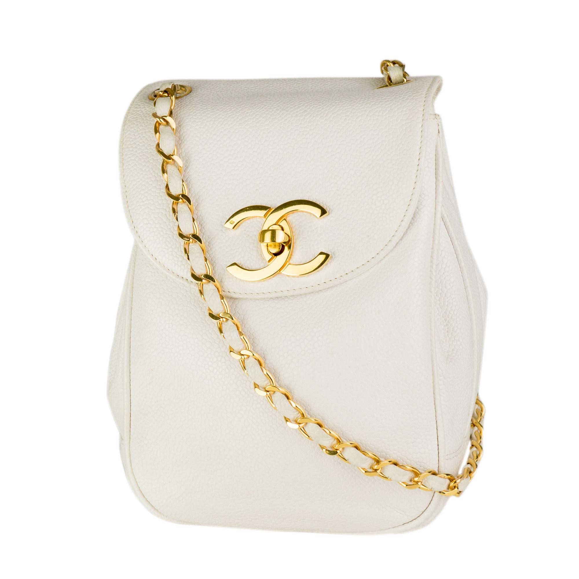 Chanel Beige Mini Boy Reissue Cross Body Flap Bag

1990's Vintage 
White bone caviar leather
Gold hardware
Classic CC Turnlock

Made in France