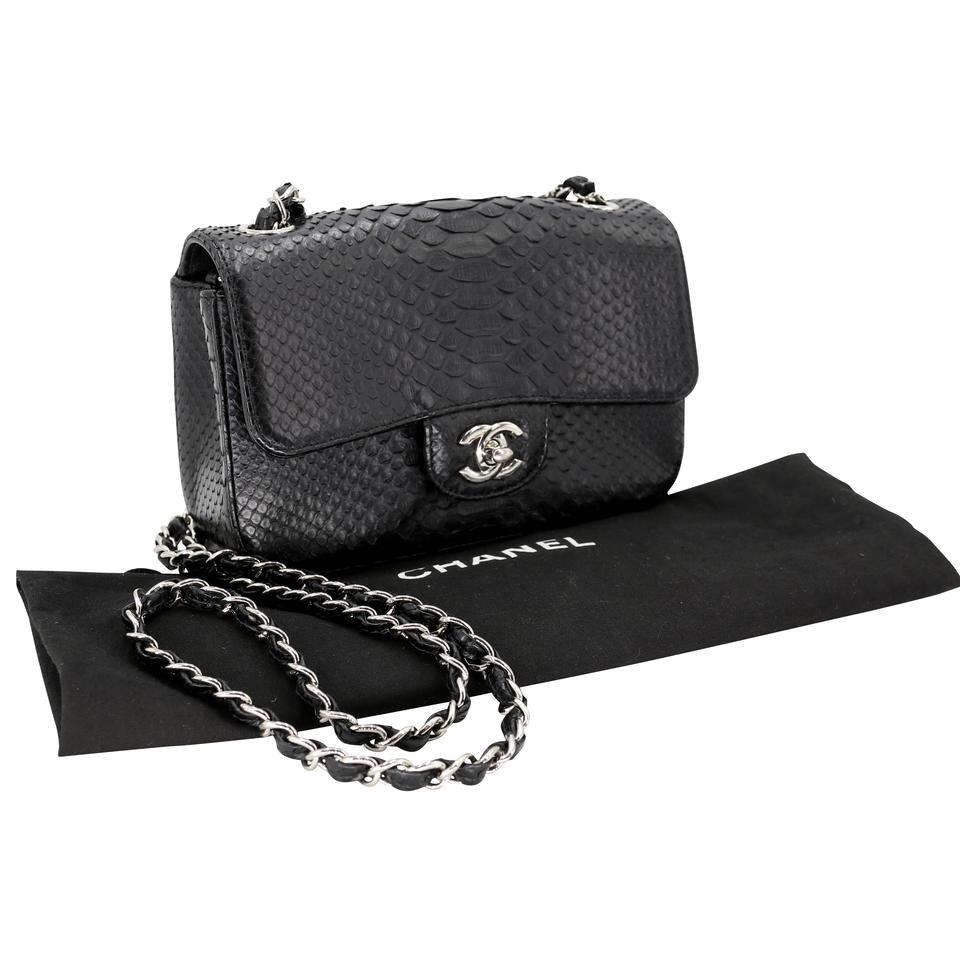 This is it! The Grail piece for your collection! This is the most sought after Chanel bag for the last years. We present you with a Super Rare and Verify@ Cc-b0910p-0001 authenticated  CHANEL Signature  Python Small Mini Flap in Black with Silver