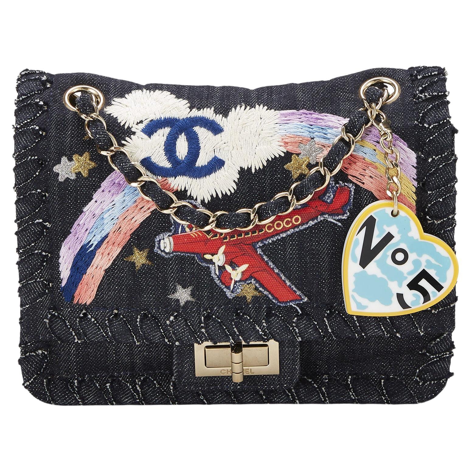 Chanel Rare Limited Edition Denim Airplanes Flap

CHANEL Denim Airplane Embroidered is a stylish shoulder flap bag is made of fine denim with an airplane patch, a rainbow and a blue Chanel CC embroidered into the bag. The bag features gold chain