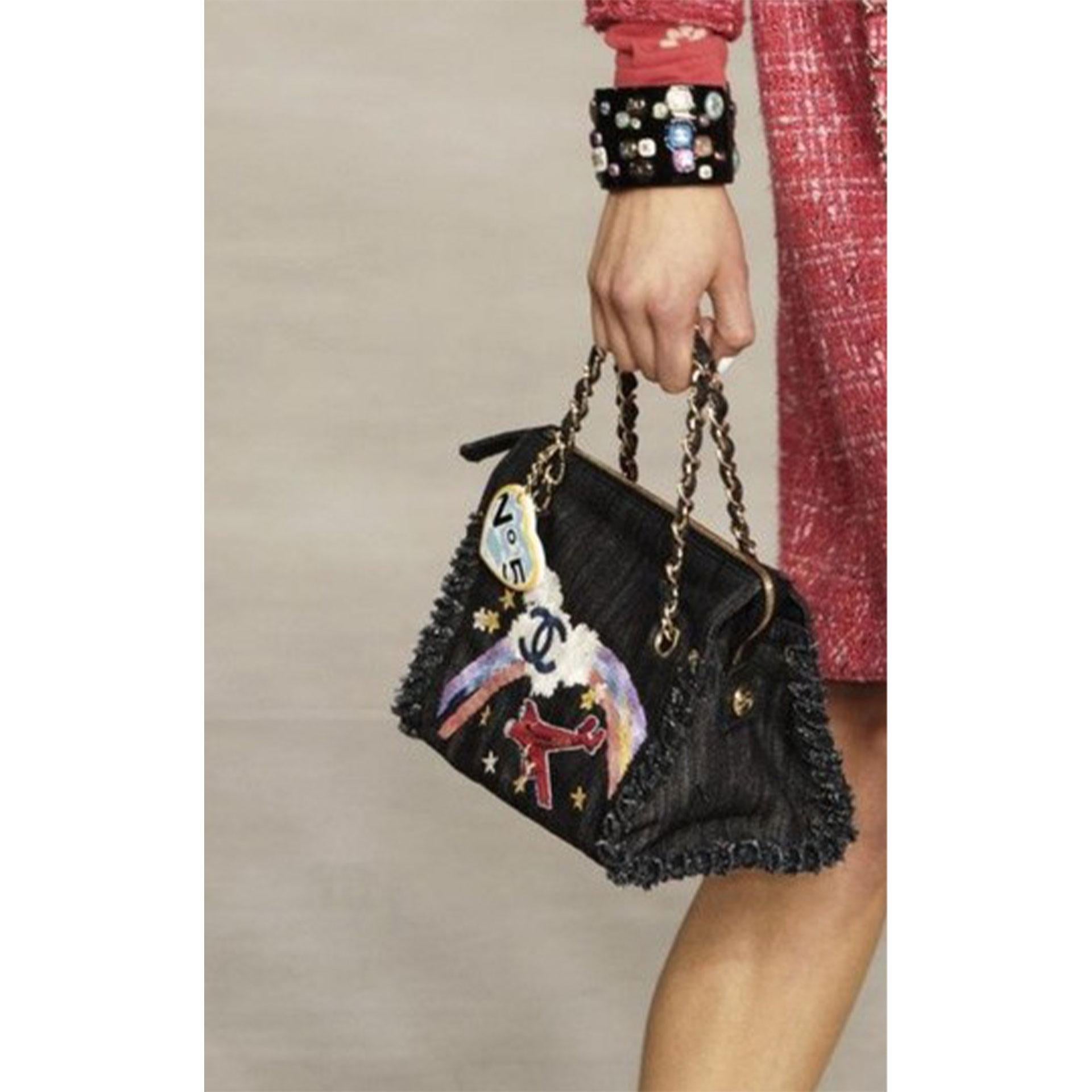 Chanel Rare Limited Edition Denim Airplanes Flap

CHANEL Denim Airplane Embroidered is a stylish shoulder flap bag is made of fine denim with an airplane patch, a rainbow and a blue Chanel CC embroidered into the bag. The bag features gold chain