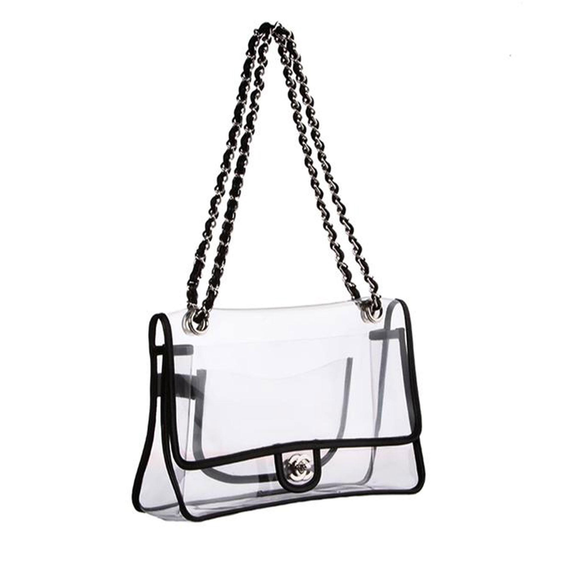Chanel Transparent Classic 2.55 Flap Vintage Clear Naked Flap

Chanel Transparent Classic Medium Flap Bag with black lambskin piping. Features Chanel interwoven black lambskin chain that can be worn on the shoulder single (25.5