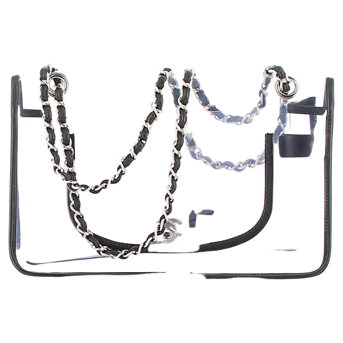 Chanel 2.55 Transparent Classic Flap
REALLY GOOD PREOWNED condition, this one has very slight traces of wear that appeared with time.
Black lamb leather piping. The black lambskin chain intertwined with Chain,
Height 18 cm / 7 