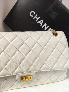 Chanel 2.55 Reissue white flap distressed leather gold hardware shoulder bag