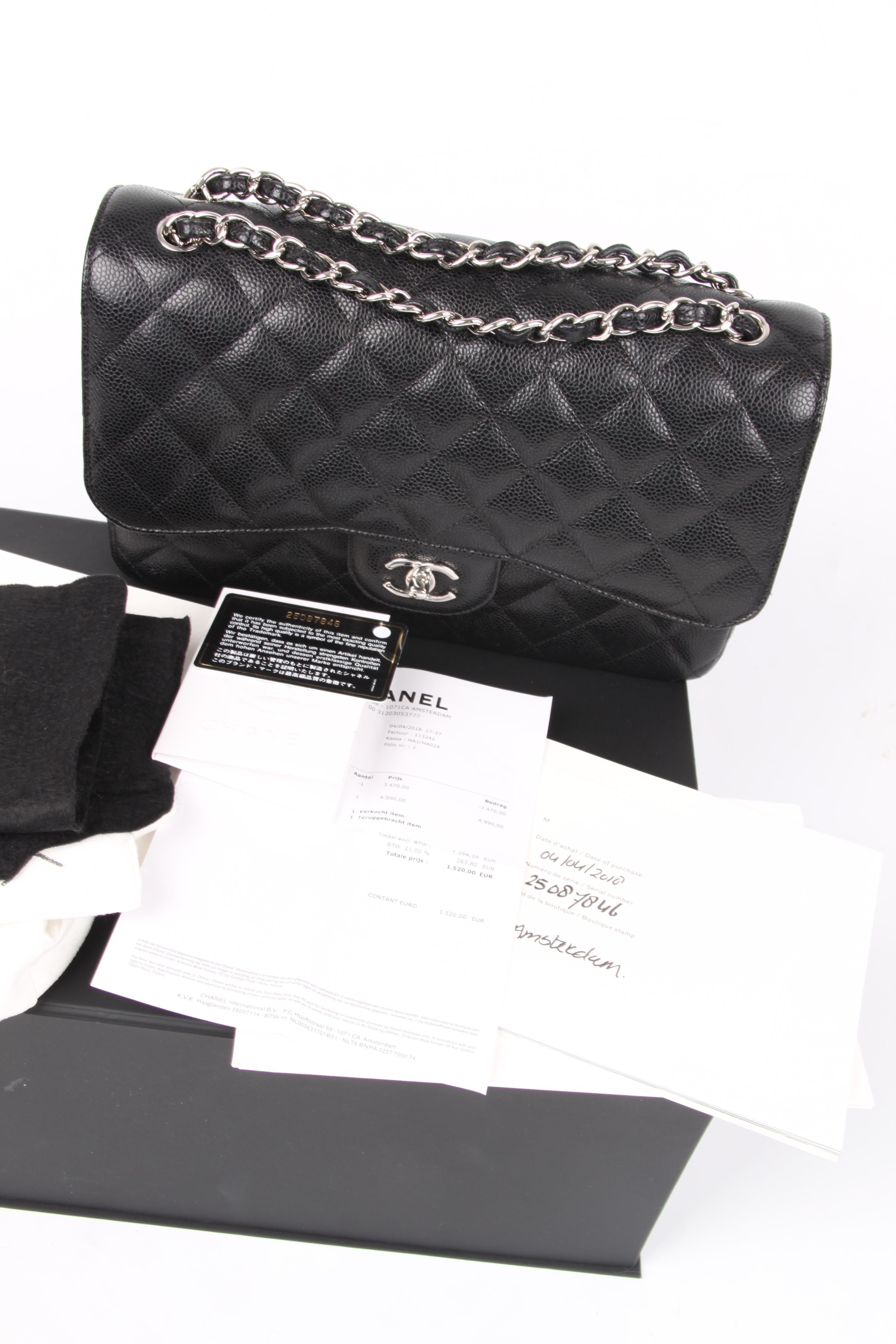 Oh yesss! Another classic bag by Chanel crafted in black caviar leather and silver-tone hardware A beauty!  

This 2.55 jumbo single flap bag is the larger size of this classic model and measures 30 centimeters in length.  A silver-tone chain which