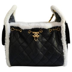 Chanel 25K Small Hobo Bag Black Calfskin with White Shearling Trim Gold Hardware