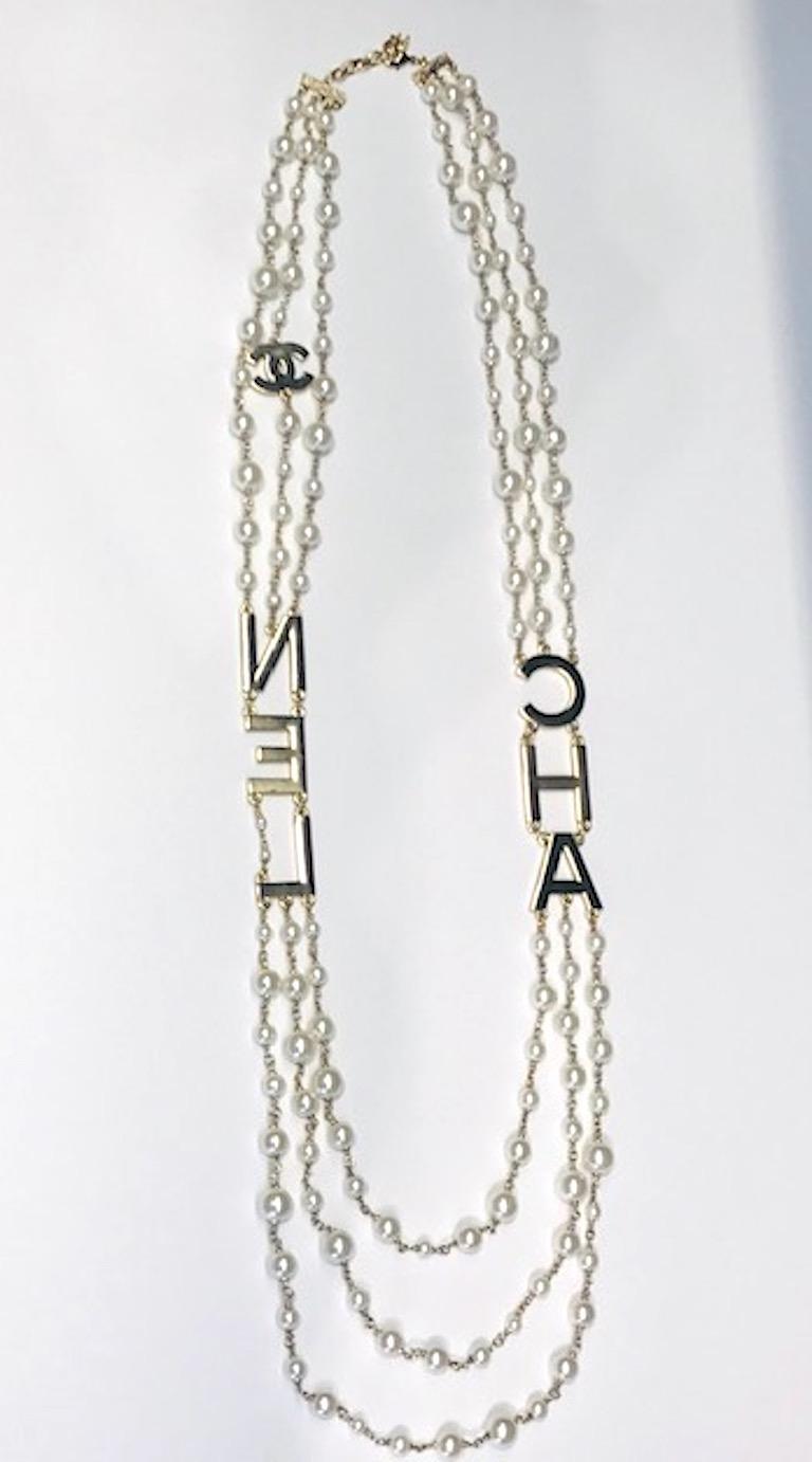Chanel 3 Strand Pearl and C H A N E L Letters Necklace, 2018 Collection For Sale at 1stdibs