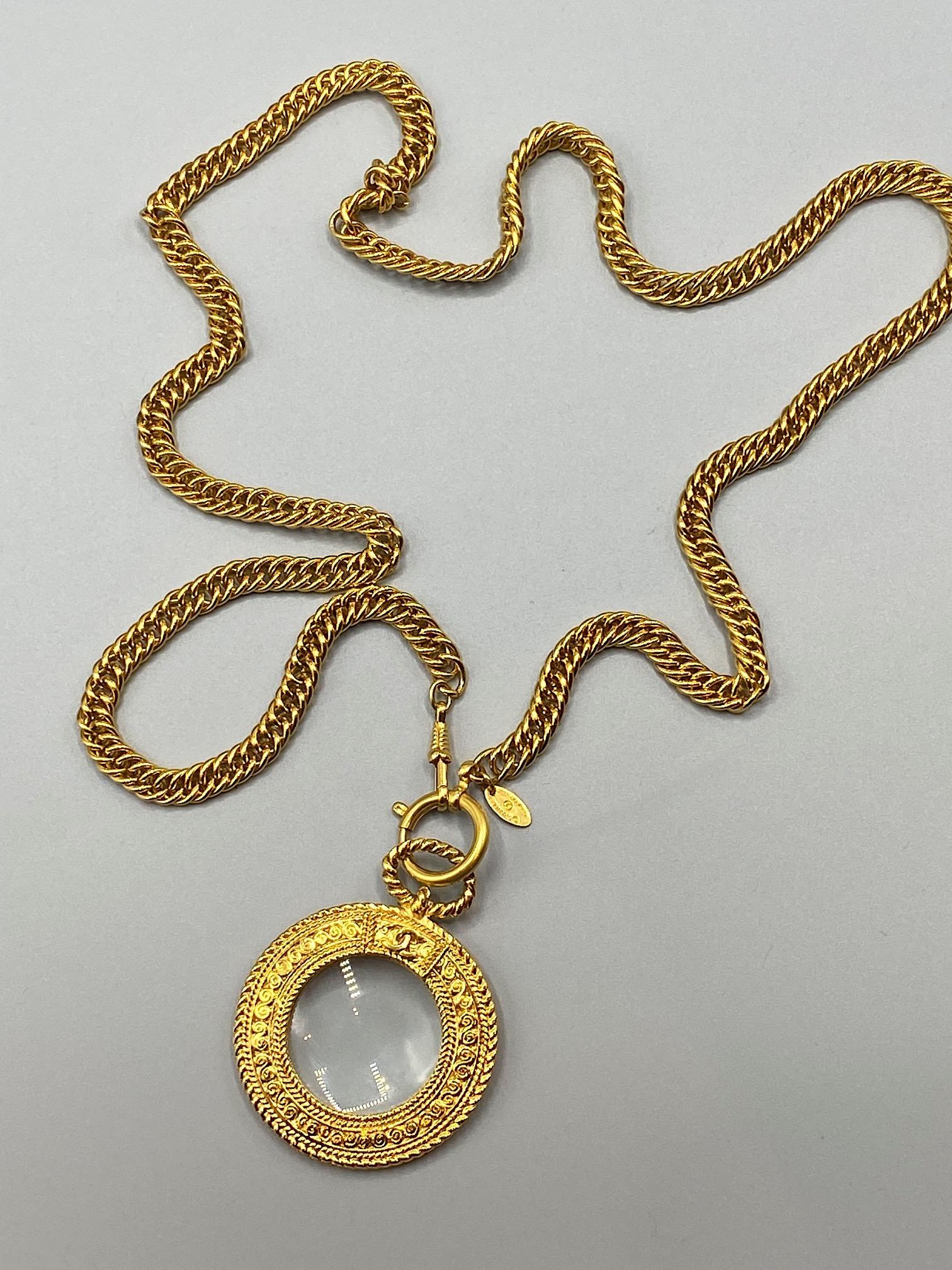 gold magnifying glass necklace