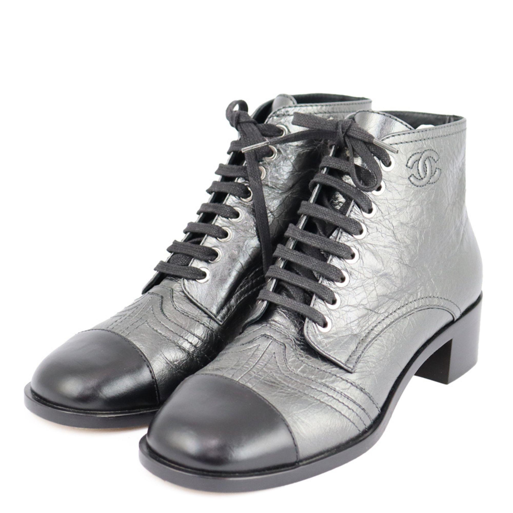 NEW Chanel black metallic CC leather cap toe lace up ankle boots . Not worn

Material: leather
Size: EU 39
Heel: 3cm
Condition: New
