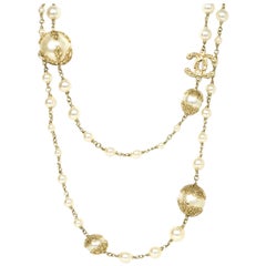 Used Chanel 49" Pearl CC Necklace with Filigree Detailing