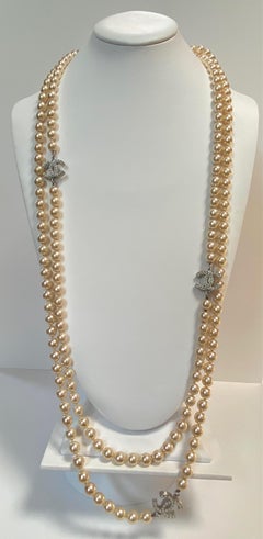Chanel 74" Long Pearl Necklace with Chanel Logo Accents 2008 Vacation Collection