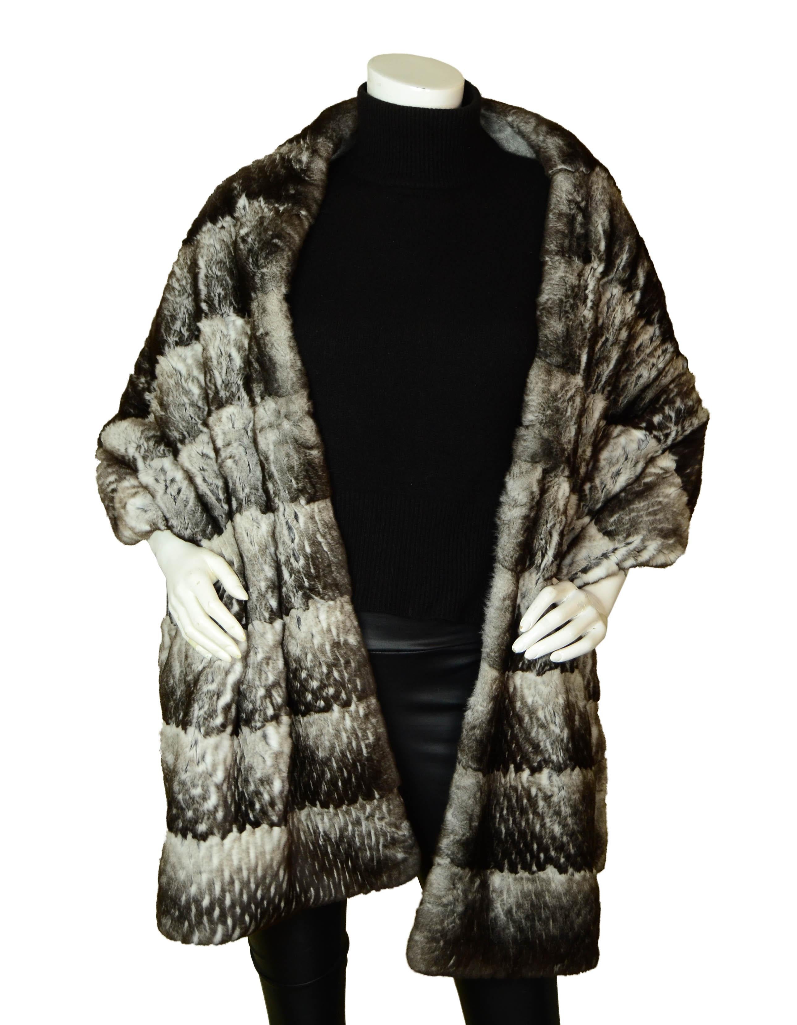 Chanel Orylag Rabbit Fur & Cashmere Stole/Throw

Made In: Italy
Color: Grey & black
Materials: Rabbit fur & cashmere
Overall Condition: Excellent

Measurements:
18.5”W x 78.5”H