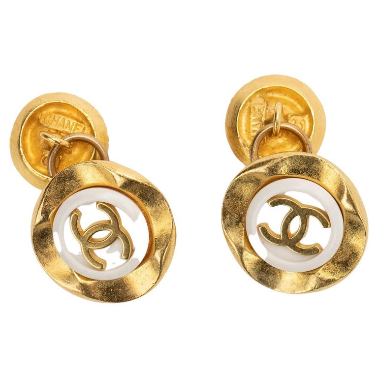 Chanel 80s Logo Gold White Cufflinks For Sale at 1stDibs