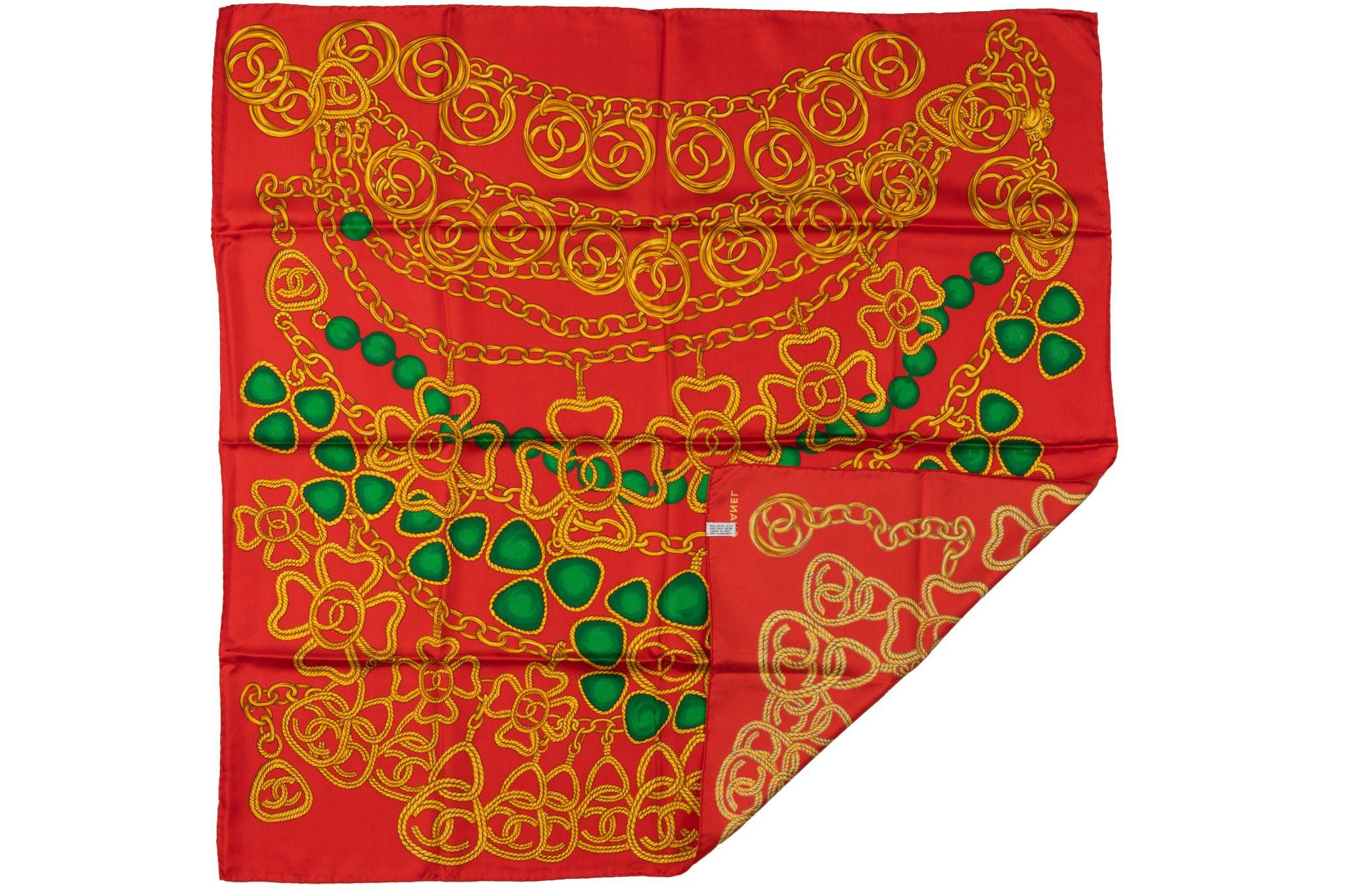 Chanel 80s vintage red silk scarf with chanel gripoix and chain jewelry design. Minor wear.