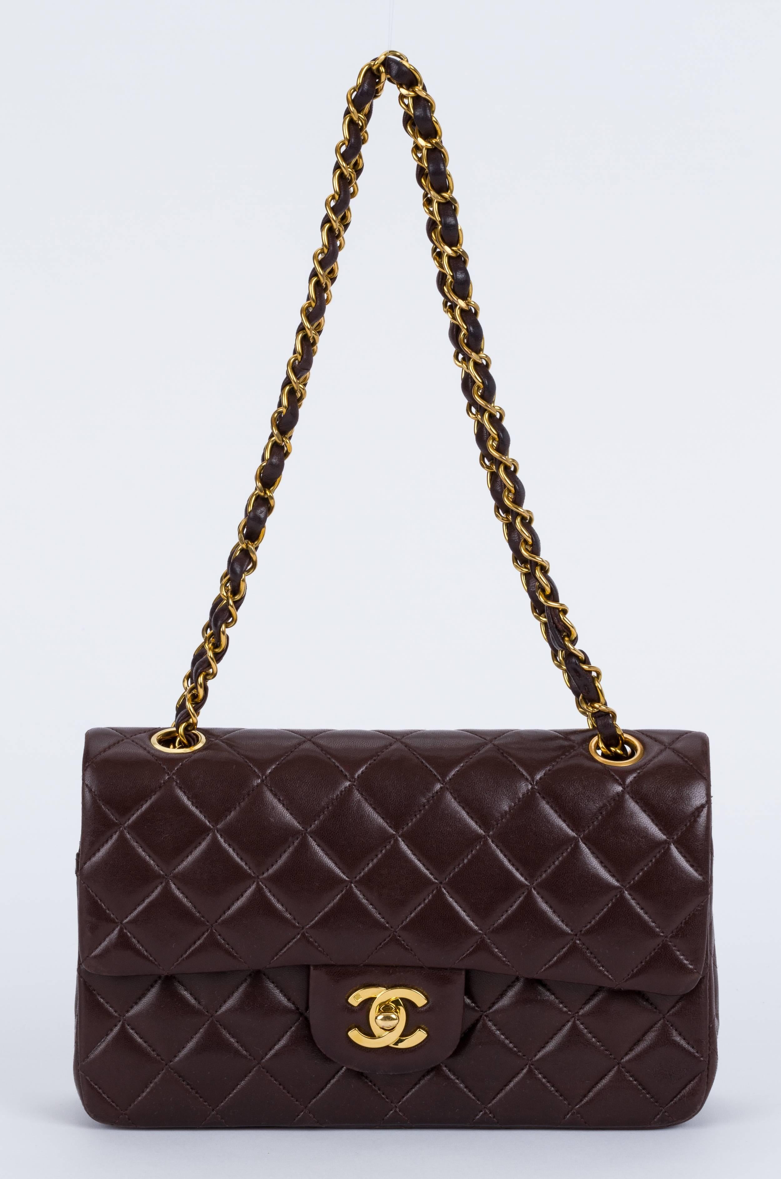 Chanel brown classic double flap lambskin 2.55 bag. Can be worn two ways: shoulder drop, 17.5