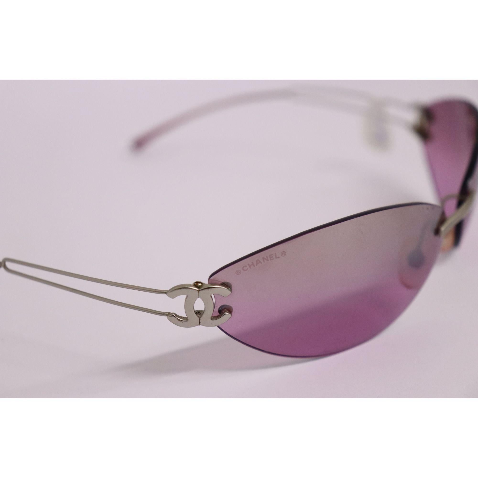 Vintage rimless pink Chanel sunglasses with silver CC. In excellent condition.

Hardware: Silver Metal

Lens: Pink

Size: 731/132/130

Condition
Overall Condition: Minimal signs of use. No scratches on lense

Extras
Includes original box