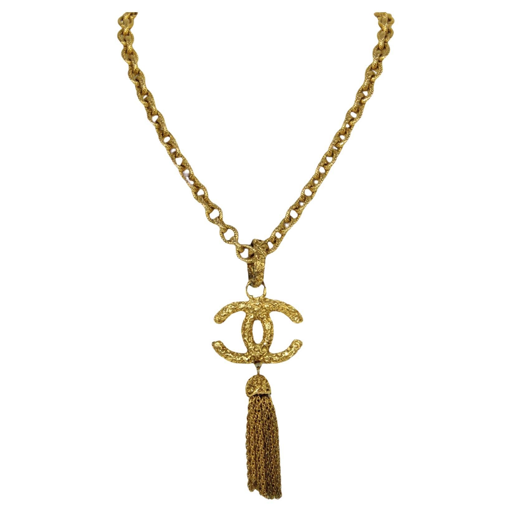 Chanel '90s Gold Vintage Textured CC Tassel Necklace For Sale