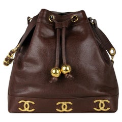Chanel '90s Vintage Brown/ Gold Logo Caviar Leather Bucket Bag