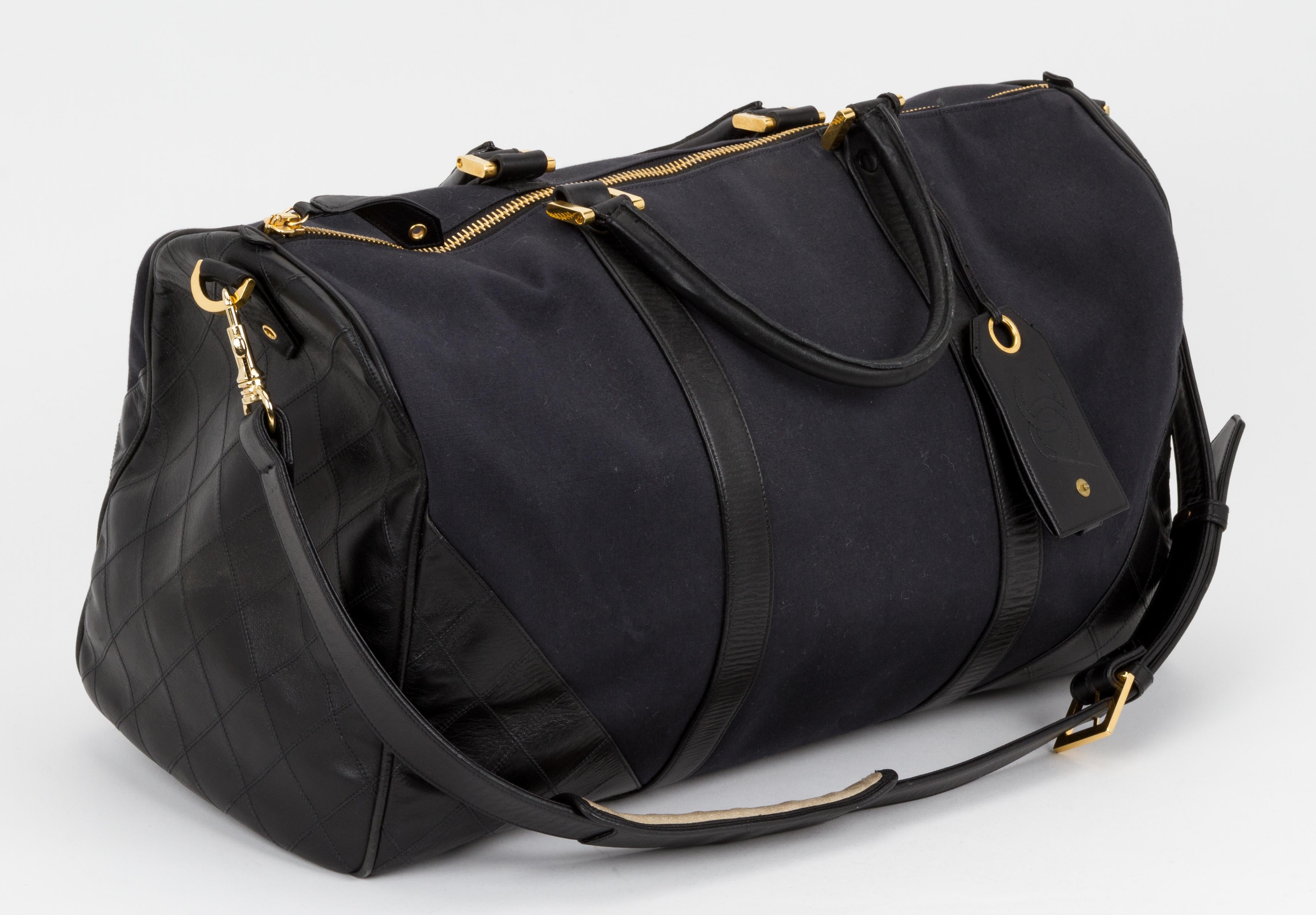 Chanel 90s Vintage Canvas and Leather Duffle Bag For Sale at Chanel 90s Vintage Canvas and Leather Duffle Bag For Sale at