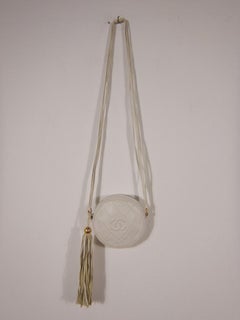 Chanel 90s Vintage Quilted White Lambskin Leather Round Fringe Pochette