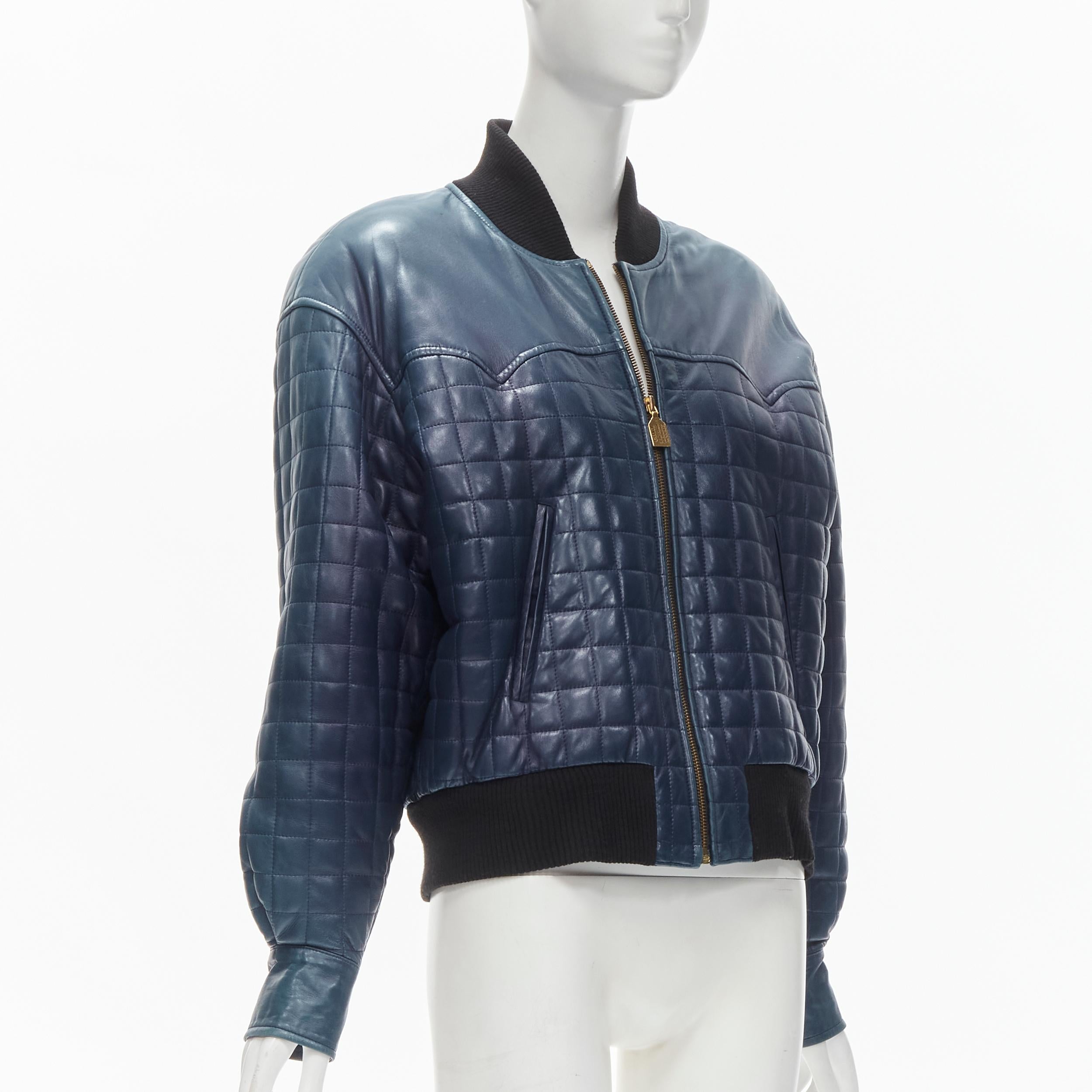 Women's CHANEL 91A  gold 31 Rue Cambon zip charm navy quilted leather jacket FR44 XL