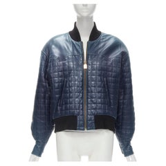 CHANEL 91A  Veste en cuir matelassé bleu marine 31 Rue Cambon avec breloque à fermeture éclair XL