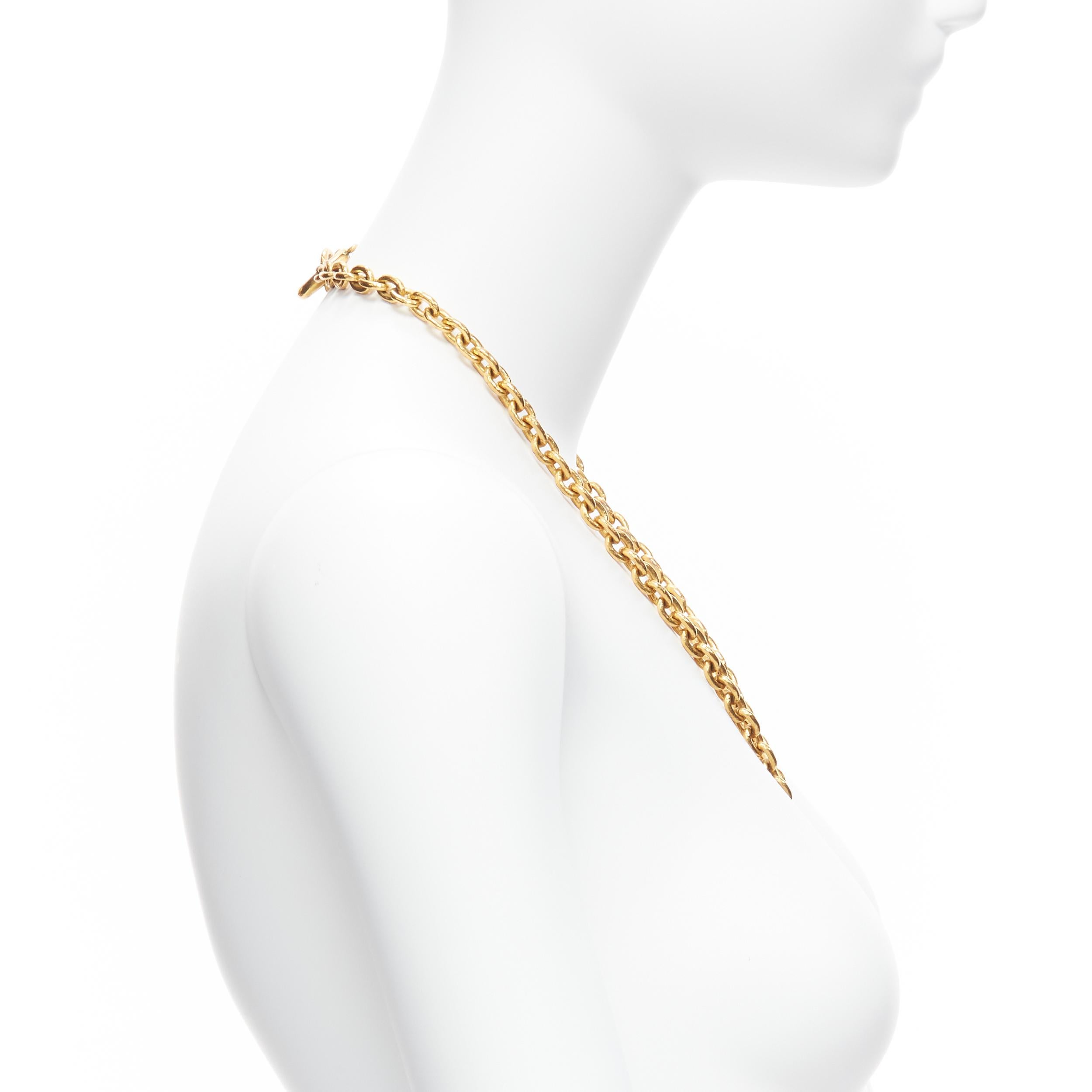 Women's CHANEL 94A Vintage gold tone interlock CC logo coin pendant chain necklace For Sale
