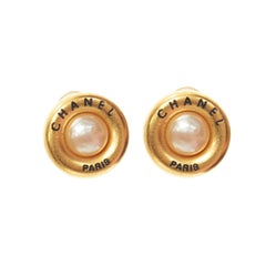 CHANEL 94P Vintage logo signed gold metal faux pearl logo clip on earring