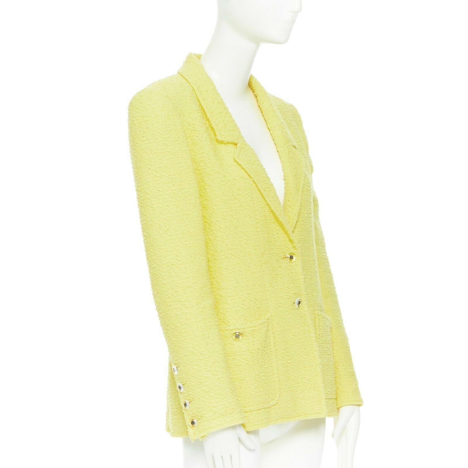 CHANEL 97C vintage baby yellow boucle tweed classic tailor blazer jacket FR40
Brand: CHANEL
Designer: Karl Lagerfeld
Collection: 97C
Model Name / Style: Tweed jacket
Material: Wool
Color: Yellow
Pattern: Solid
Closure: Button
Lining material: