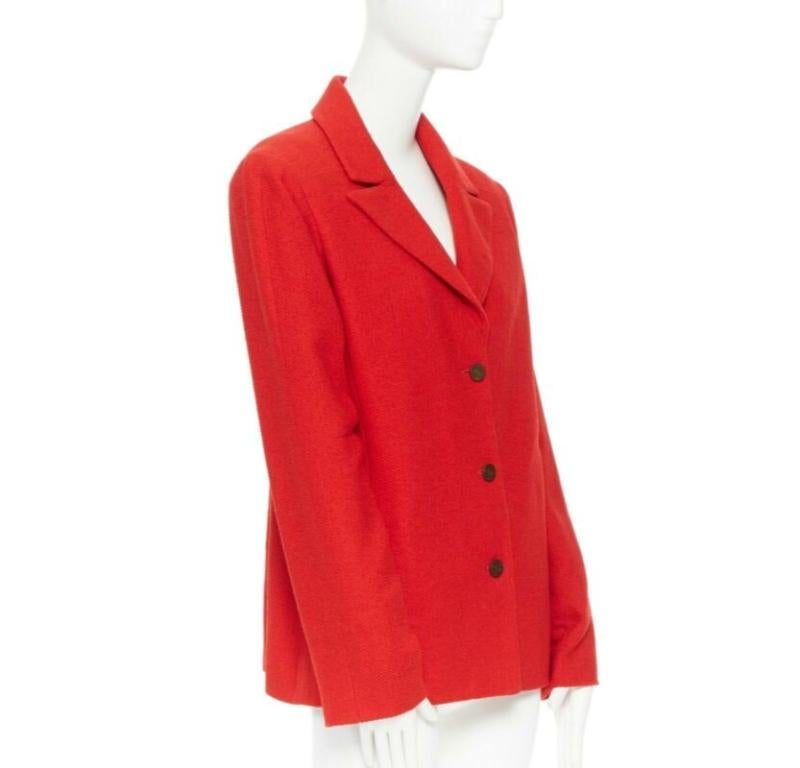 CHANEL 98A vintage lipstick red tweed peak lapel copper CC blazer jacket FR44
Reference: BMPA/A00017
Brand: Chanel
Designer: Karl Lagerfeld
Material: Wool
Color: Red
Pattern: Solid
Closure: Button
Extra Details: Tweed knit exterior. Peak lapel.