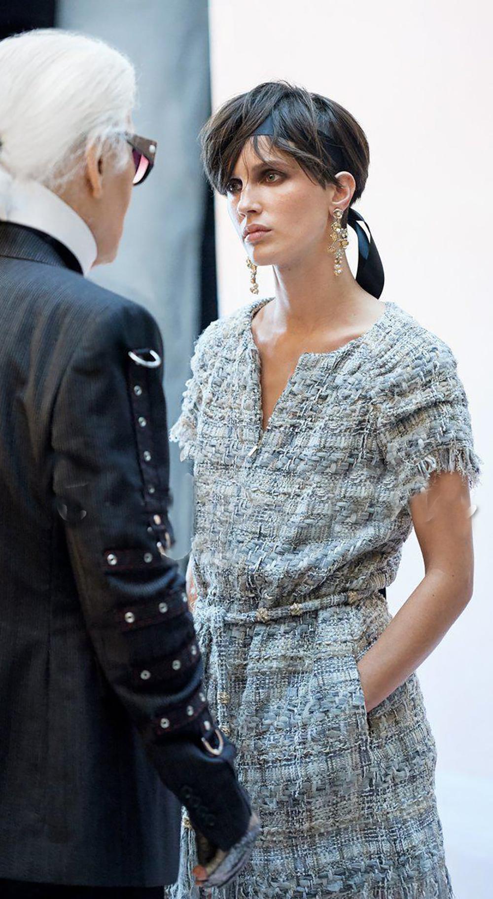 Fabulous Chanel ribbon tweed dress from Paris / GREECE 2018 Cruise Collection, 18C
As seen in Ad Campaign on Supermodel Victoria Ceretti!
- CC jewel belt at waist
Size mark 34 FR. Condition is pristine.