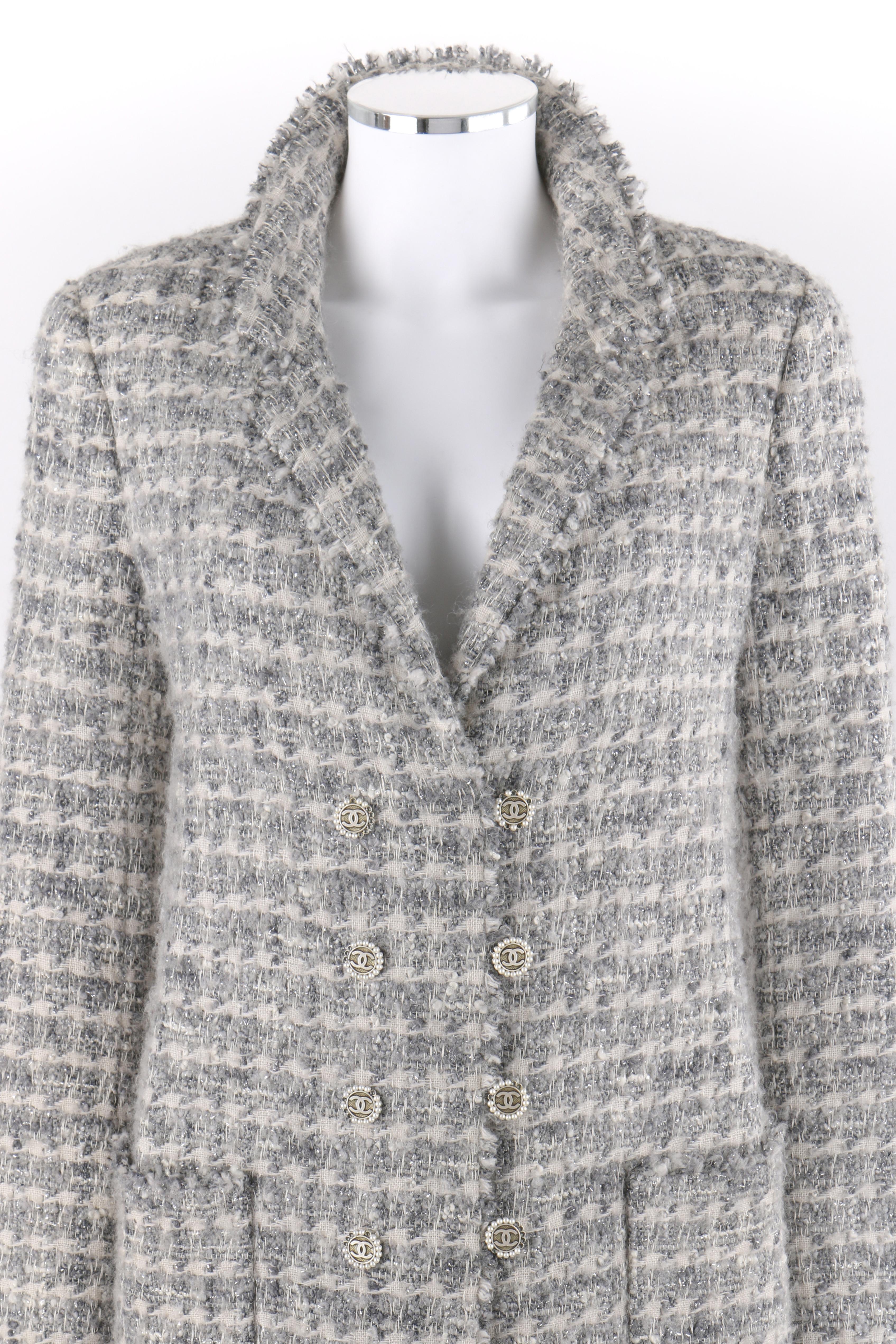CHANEL A/W 2005 Grey Silver Metallic Classic Fantasy Tweed Boucle Wool Box Coat Pearl
  
Brand / Manufacturer: Chanel 
Collection: Autumn / Winter 2005; Runway look #18
Style: Box Coat
Color(s): Shades of white, grey and silver. 
Lined: Yes     