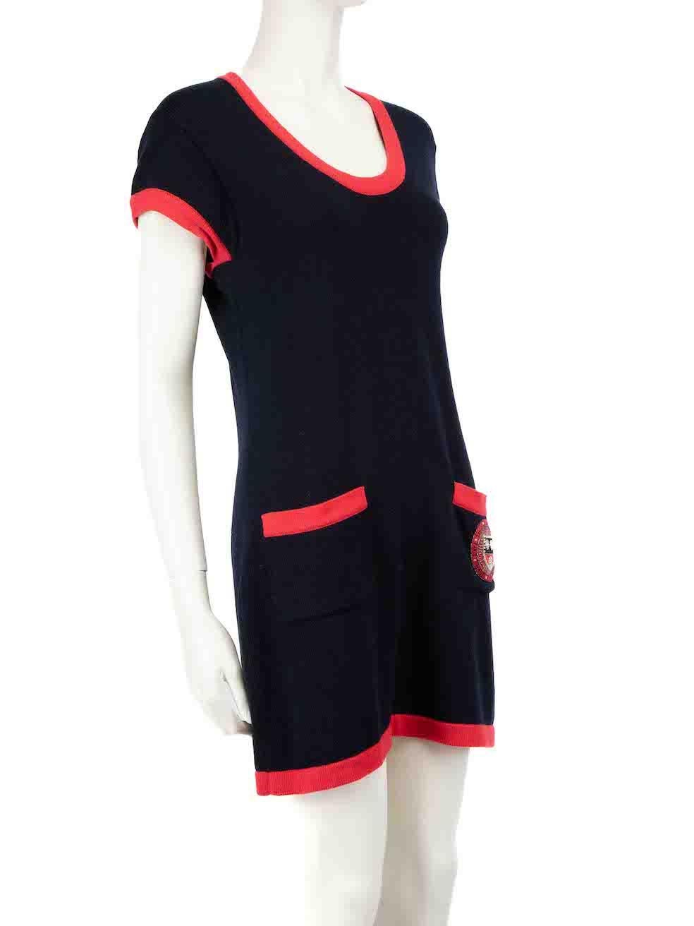 CONDITION is Very good. Minimal wear to dress is evident. Minimal wear to the embellishment with the pearlescent finish having faded on this used Chanel designer resale item.
 
 
 
 Details
 
 
 A/W 2007
 
 Navy
 
 Cashmere
 
 Mini dress
 
 Knitted