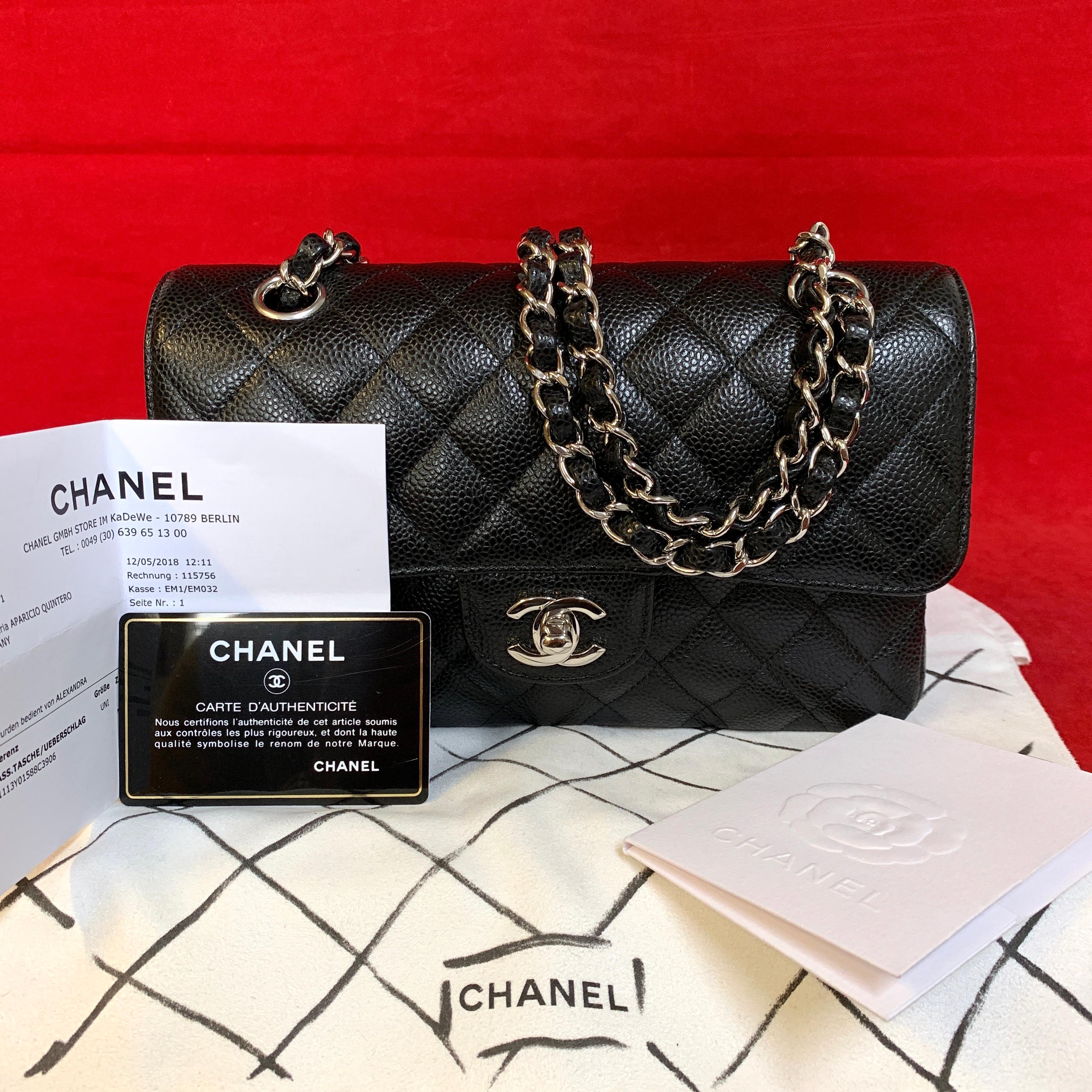 CHANEL classic double flap Bag small made of black quilted caviar with silver hardware.
Model number: A01113

The bag is in a very good condition and has no signs of use.

The delivery includes:
- Chanel small double flap bag
- Dustbag
- Original