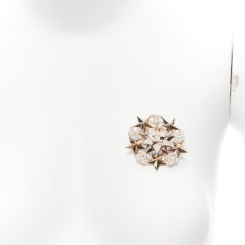 CHANEL A17C crystal CC logo gold tone star motive badge style pin brooch
Reference: GIYG/A00282
Brand: Chanel
Collection: A17C
Material: Metal
Color: Gold, Clear
Pattern: Solid
Closure: Pin
Made in: France

CONDITION:
Condition: Fair, this item was
