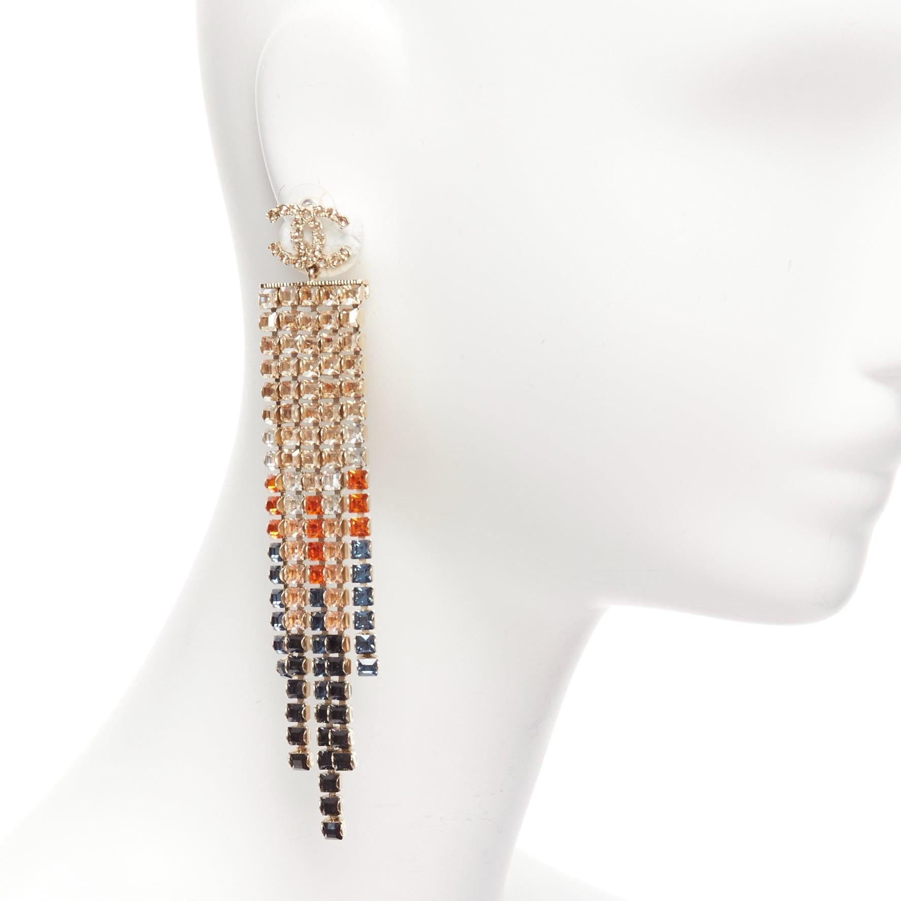 CHANEL A19A gold CC crystal gradient tassel cascade drop pin earrings pair
Reference: AAWC/A01064
Brand: Chanel
Designer: Karl Lagerfeld
Collection: A19A
Material: Metal
Color: Gold, Multicolour
Pattern: Crystals
Closure: Pin
Lining: Gold Metal
Made