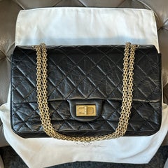 Chanel A37590 Maxi, Jumbo Flap Bag 2.55 Black/Gold Distressed Lambskin