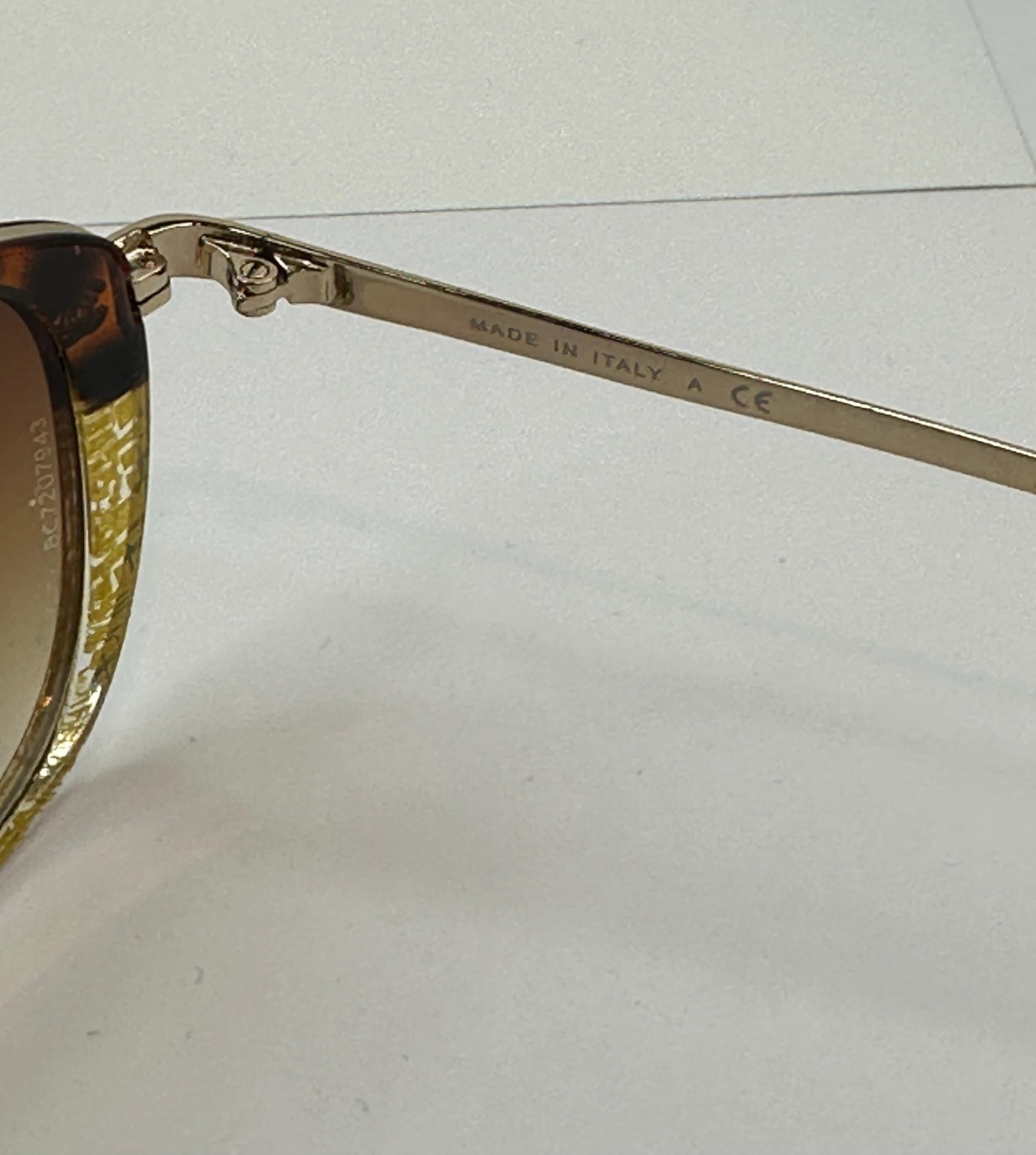 Chanel Abstract Gold and Tortoise Shell Accented With Gold Hardware Sunglasses In Good Condition For Sale In New York, NY