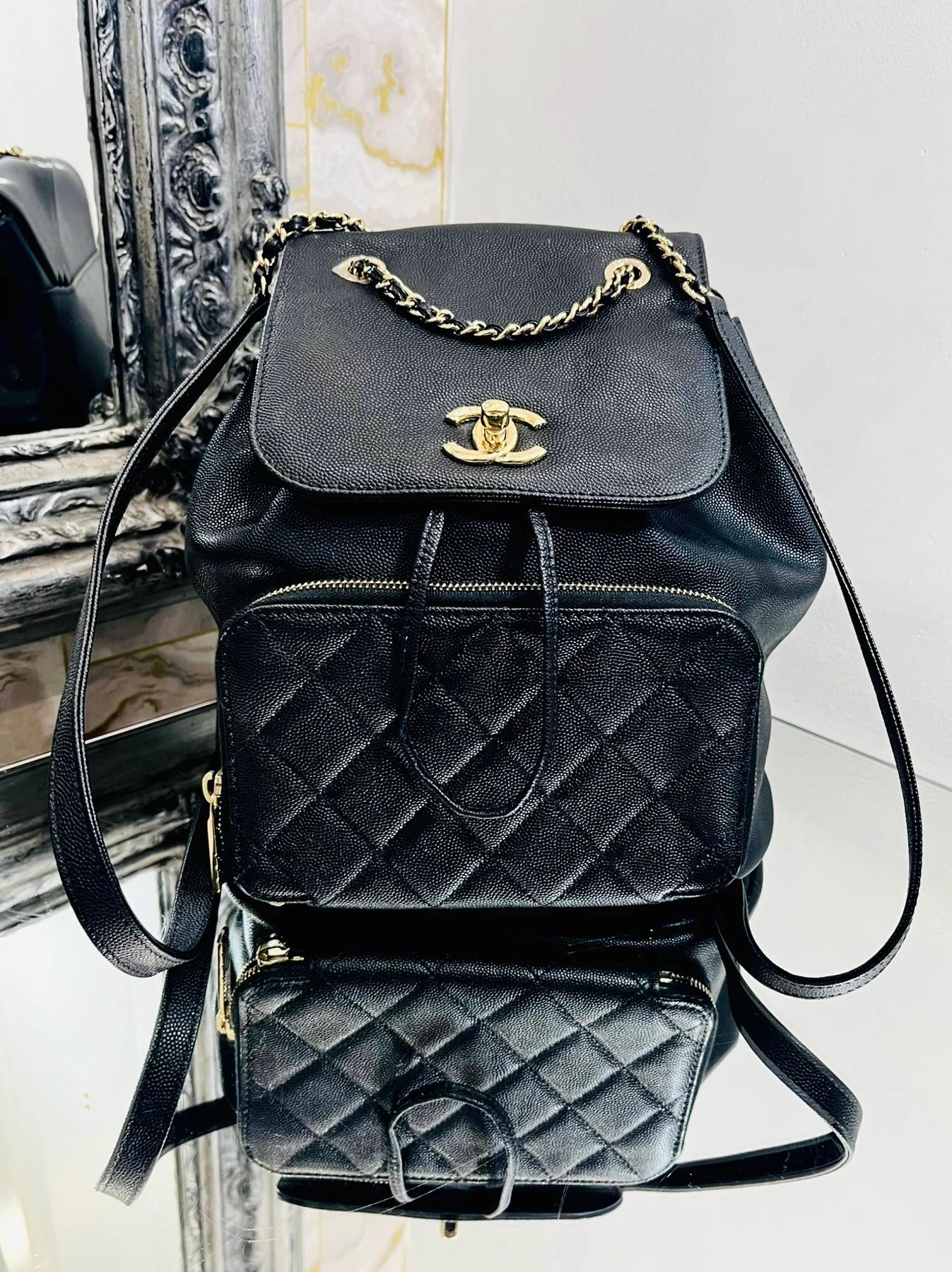 Chanel Affinity Caviar Leather Backpack

Caviar and quilted, diamond stitch leather with champagne gold 'CC' logo hardware. Timeless twist lock closure, Drawstring pull, zipper compartment to front and open back pocket to rear.

Additional